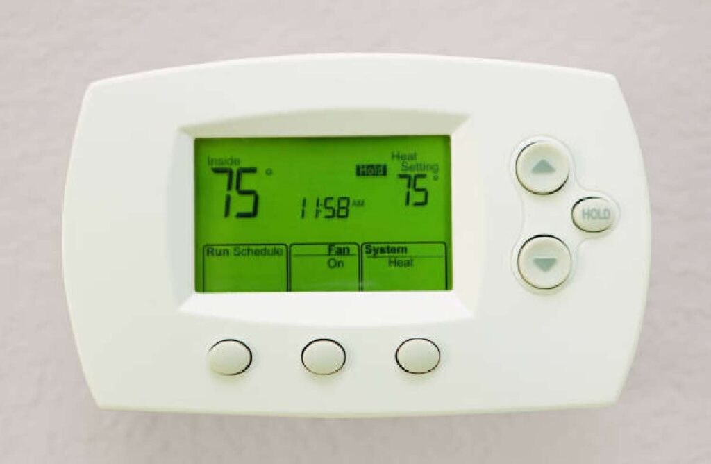 Drayton wireless thermostat promoting energy efficiency and cost savings.